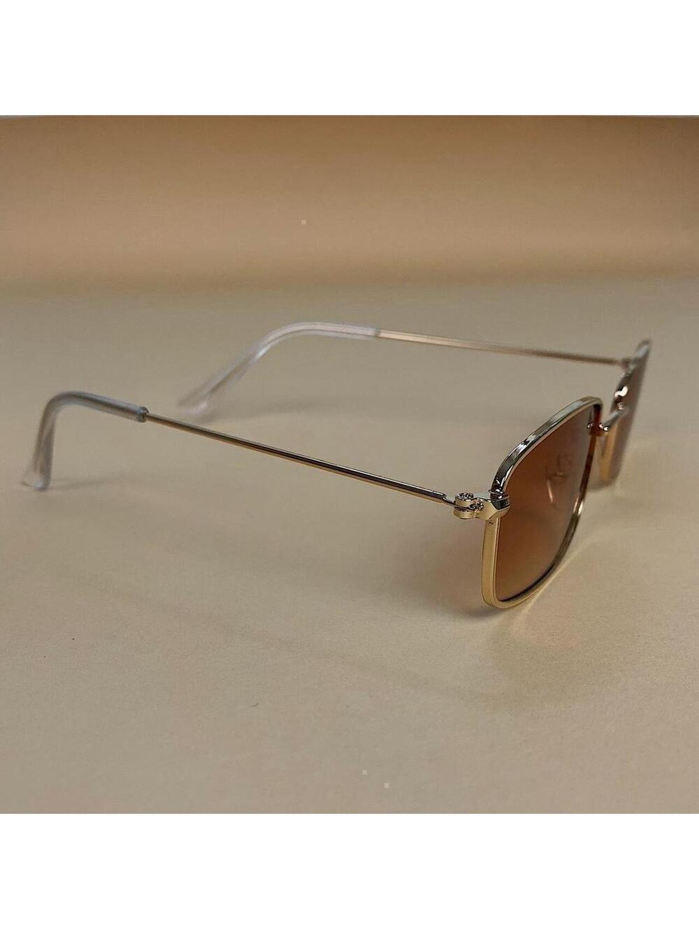 Brown and gold slim sunglasses. Brown trim with brown lenses. Glasses are - Picture 2 of 6